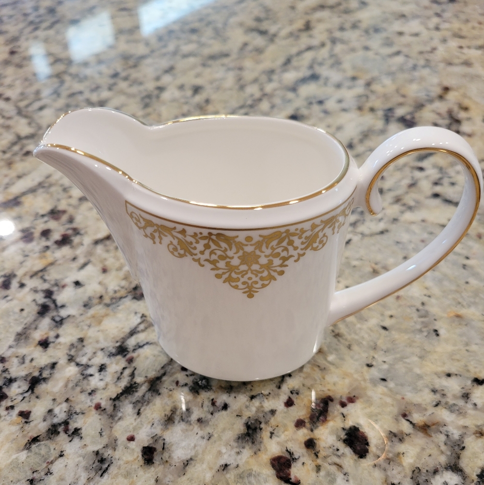 Elegant White and Gold Creamer